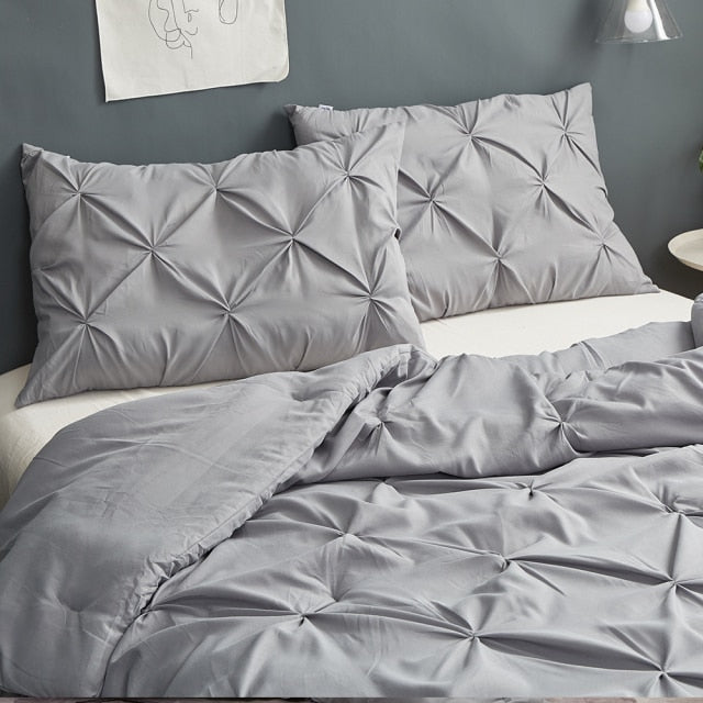 Luxurious pinch pleated bedding set